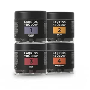 Vier schwarze Dosen Lakrids by Bülow Lakritze in Sweet, Salty, Red und Habanero