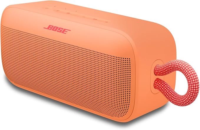 Pfirsichfarbener Bose SoundLink Plus Bluetooth-Lautsprecher mit rot-weißer Trageschlaufe