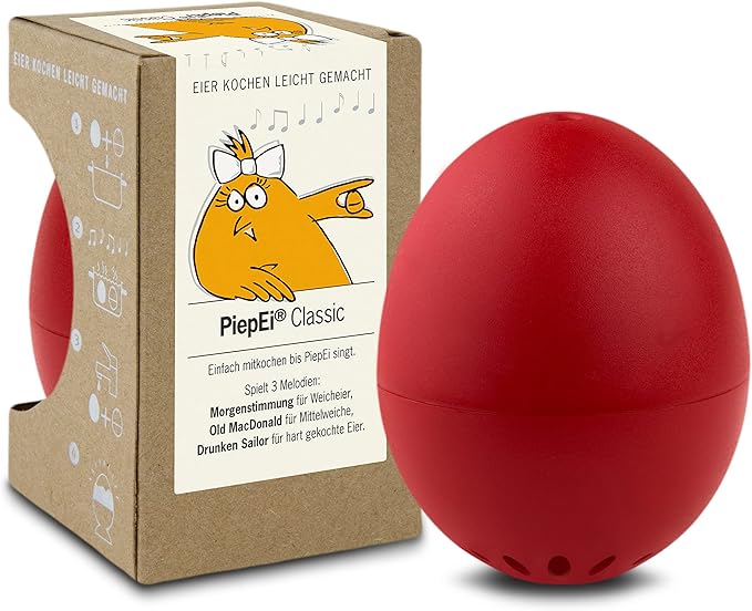 Rotes eiförmiges PiepEi neben Verpackung mit singendem Küken